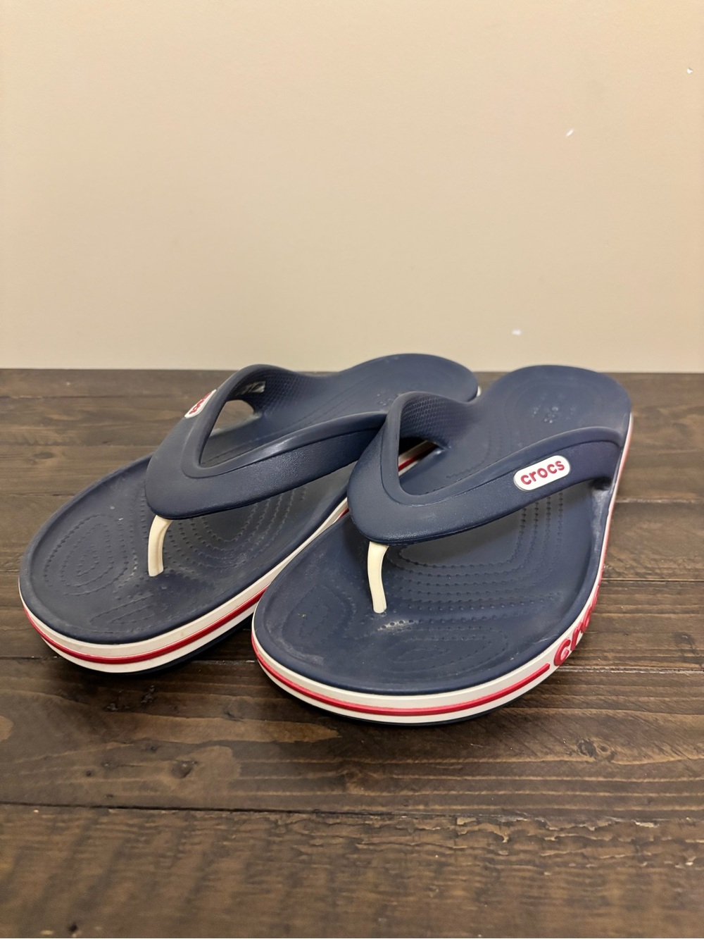 CROCS Navy Blue Flip Sandals with White Toe Post and Red/White Midsole Trim